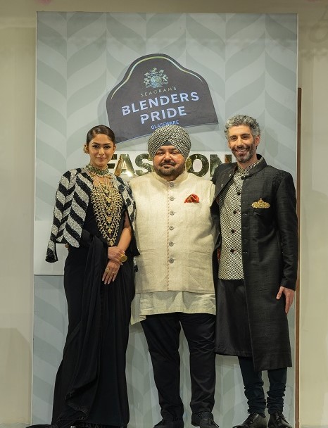Mrunal Thakur and Jim Sarbh with designer JJ Valaya at the Blenders Pride Glassware Fashion NXT preview in Hyderabad