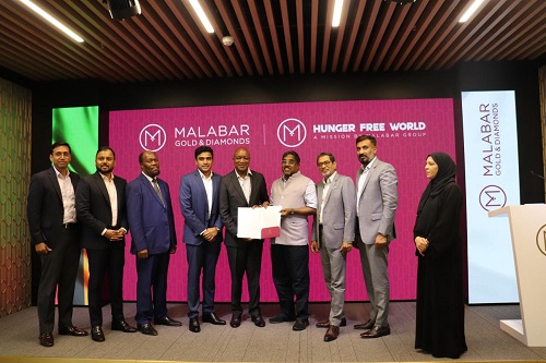 MP Ahammed, Malabar Group Chairman, presents 'Hunger Free World' project documents to Zambia's Minister of Education, Douglas Syakalima, marking a milestone in Malabar's impactful CSR endeavours in Zambia