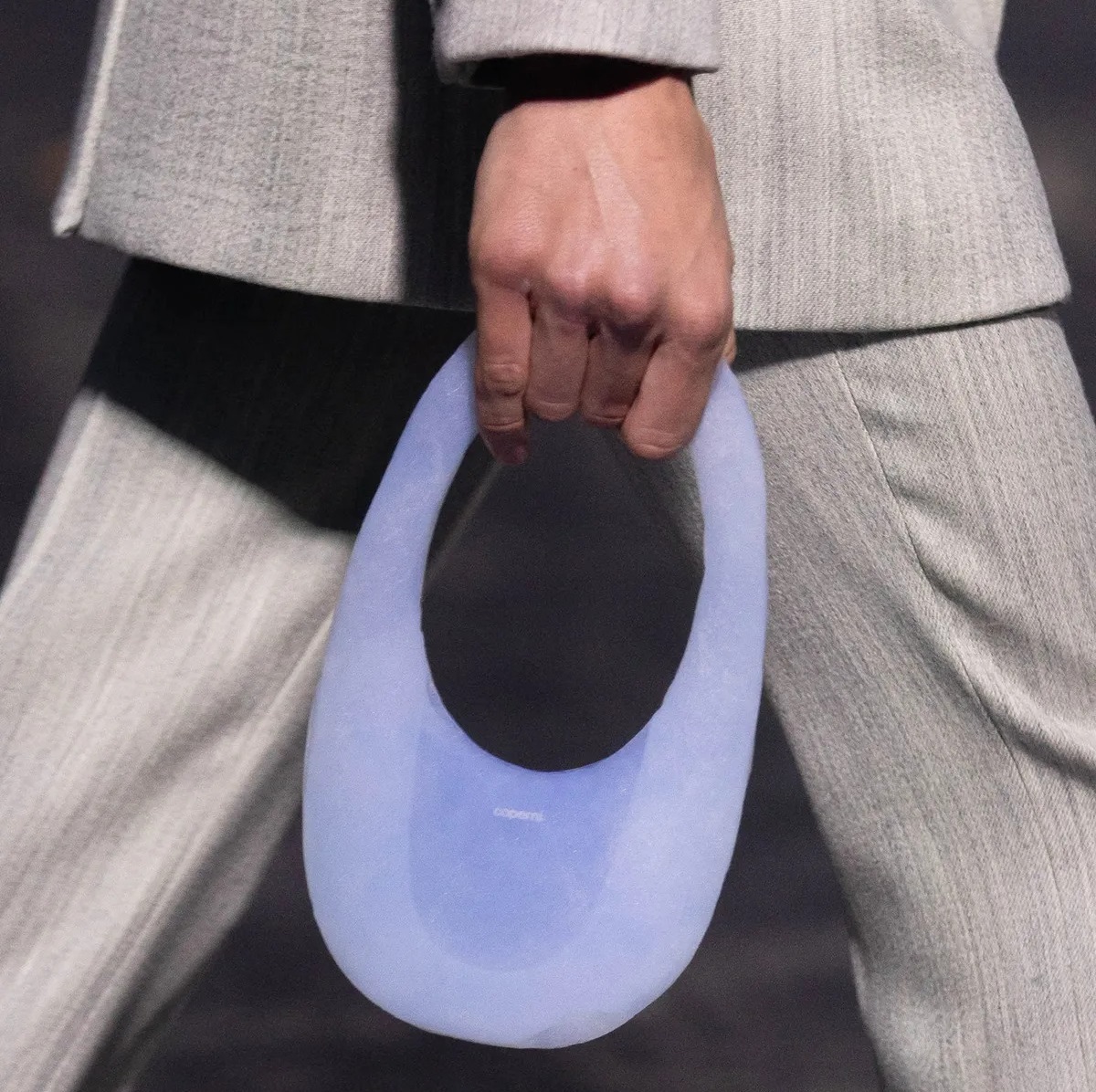 The aerogel AirSwipe bag Michaloudis created for Coperni’s 2024 fall collection debut appears almost luminous in its model’s hand. The bag immediately captured the world’s attention. Coperni