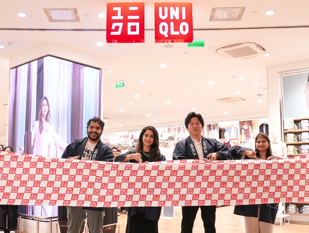 (L-R: Mayank Soni- First Customer; Neha Kapoor - Retail Director & President Leasing, Phoenix Malls; Kaneko Yuichiro- Co- COO, UNIQLO India; Sonal Garg- Store Manager, Phoenix Marketcity Bengaluru)